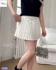 Chân váy xếp ly trắng kem đính nơ