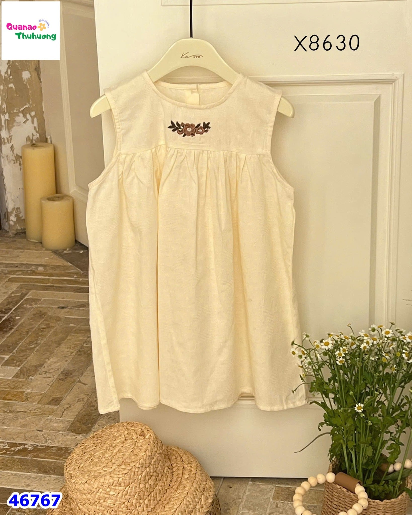 Đầm kem sát nách thêu hoa