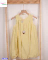 Đầm bí vàng thêu nút