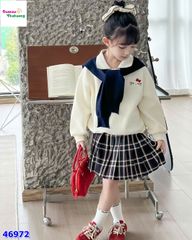 Set áo polo kem Kitty, chân váy caro xanh