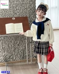 Set áo polo kem Kitty, chân váy caro xanh