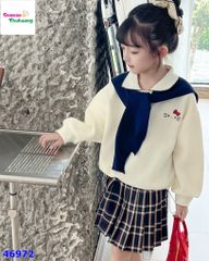 Set áo polo kem Kitty, chân váy caro xanh