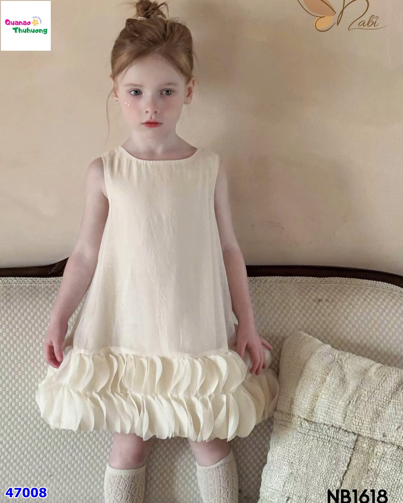 Đầm Nabi kem phối bồng