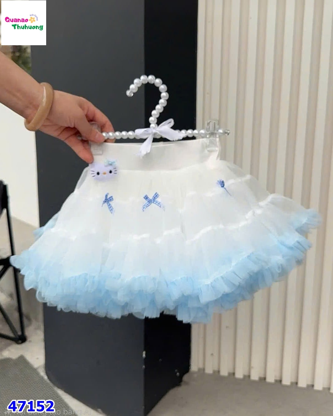 Chân váy tutu trắng loang xanh ren bồng