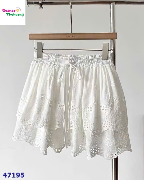 Chân váy trắng dập hoa to