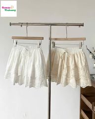 Chân váy trắng dập hoa to