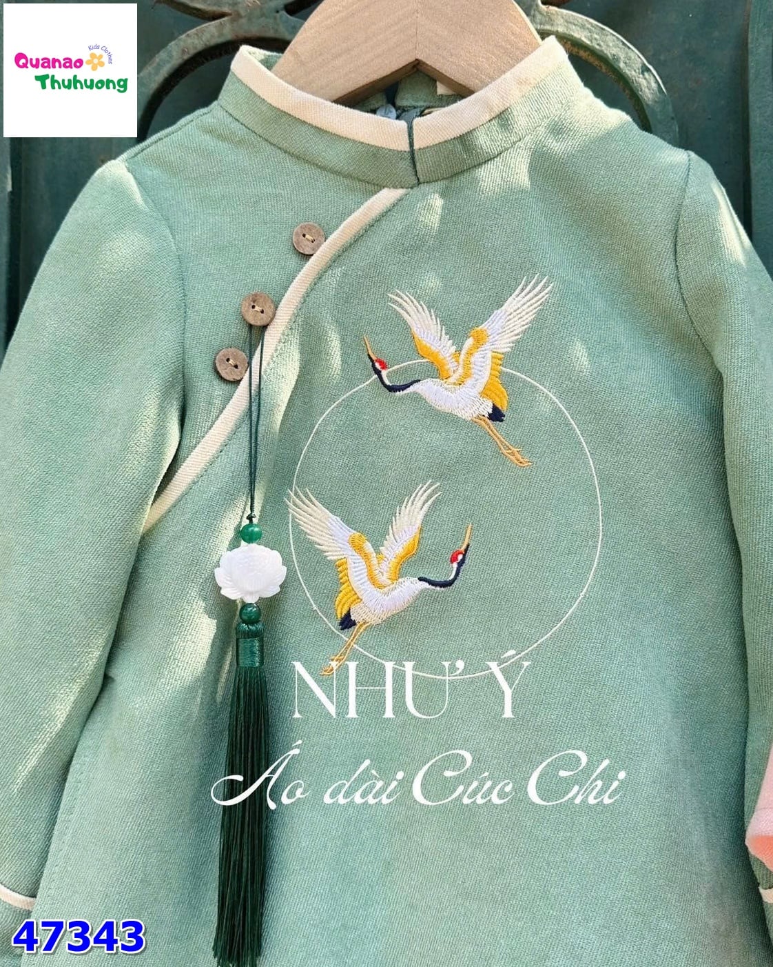 Áo dài Cúc Chi xanh thêu hạc Như Ý