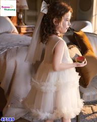 Đầm kem đính cườm nơ