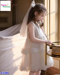 Đầm kem đính cườm nơ