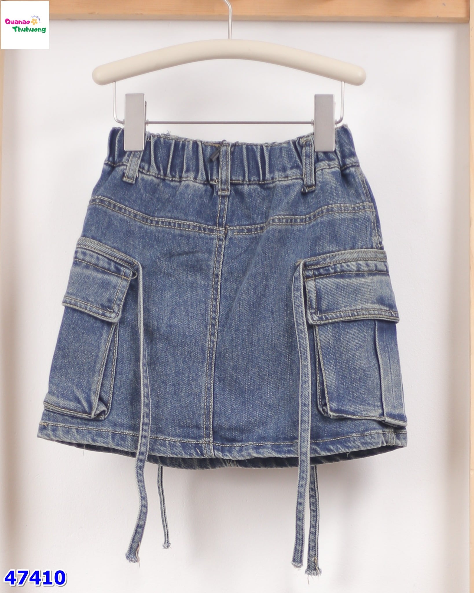 Chân váy jean Syci túi hộp đính dây
