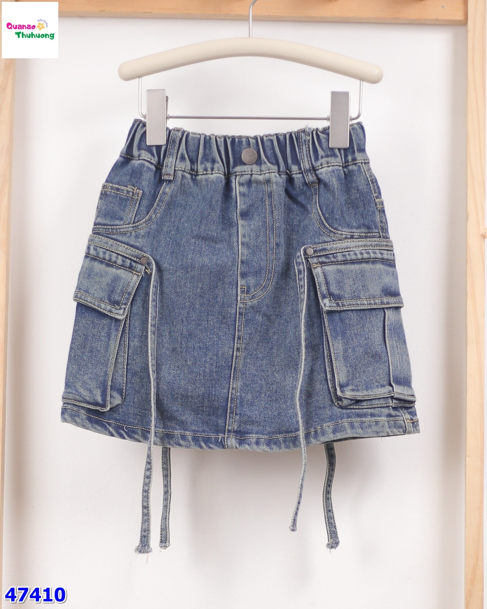 Chân váy jean Syci túi hộp đính dây