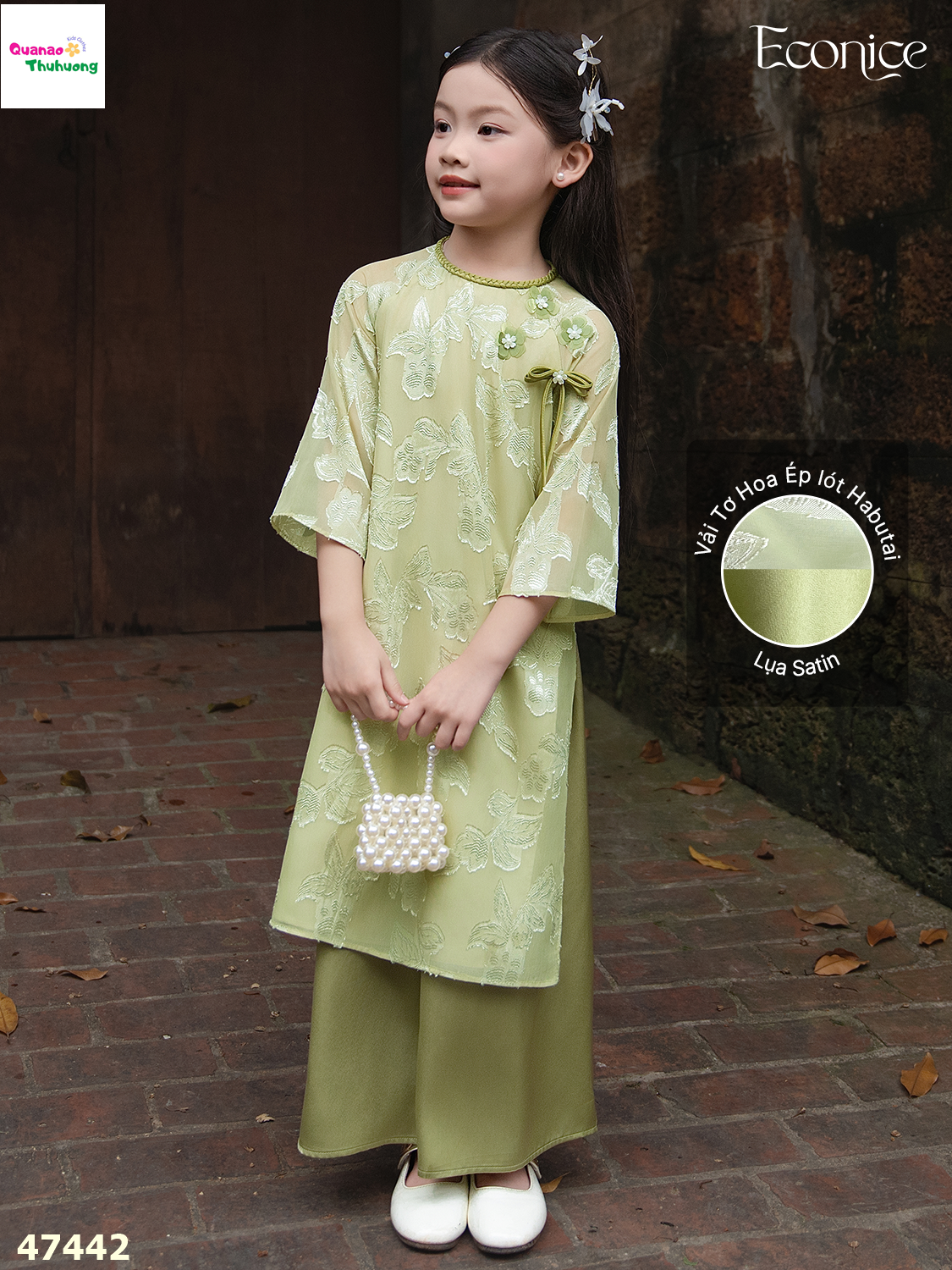 Áo dài Econice xanh lá Tô Linh