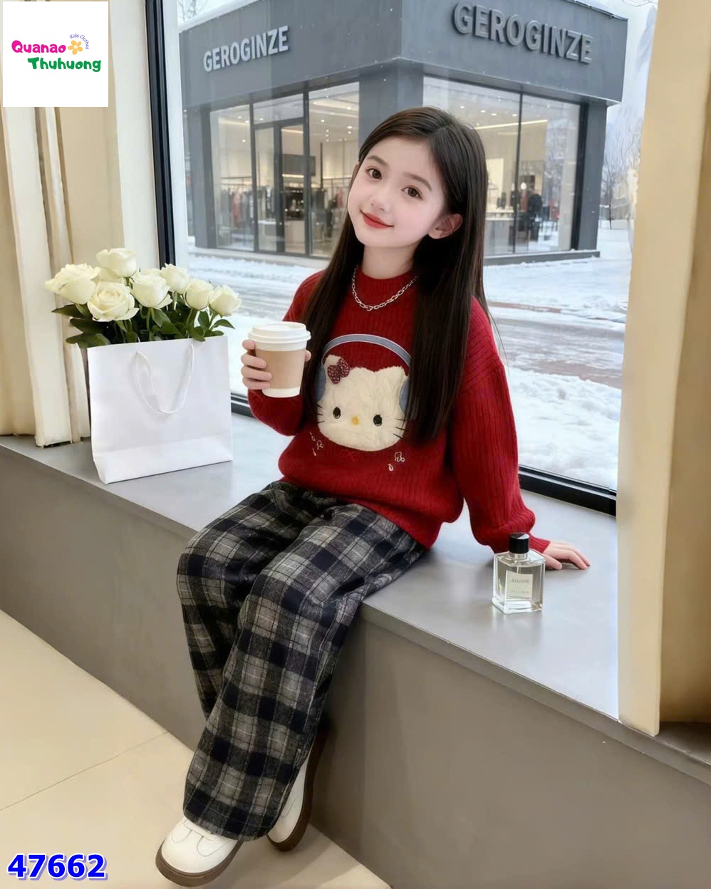 Áo len đỏ Kitty đeo tai nghe