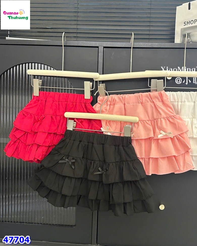 Chân váy tầng đen nơ