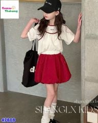 Set áo trắng, chân váy bí đỏ
