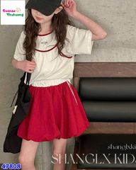 Set áo trắng, chân váy bí đỏ
