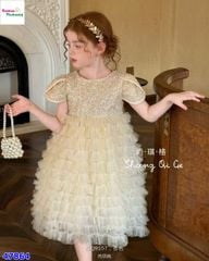 Đầm tiệc kem kim tuyến nơ