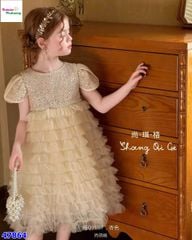 Đầm tiệc kem kim tuyến nơ