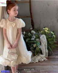 Đầm kem xuông viền bèo đính nơ