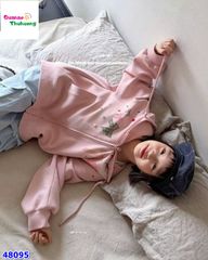 Áo khoác hồng nhiều nơ