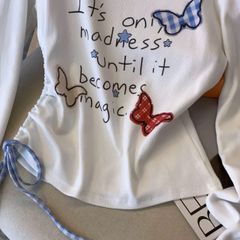 Áo trắng lệch vai bướm