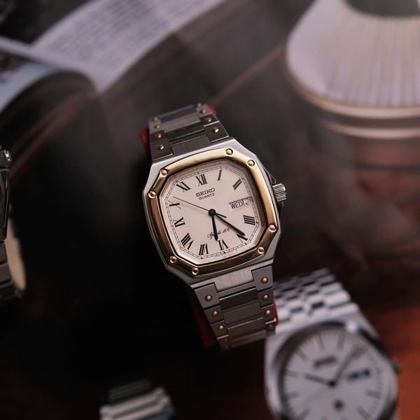  VINTAGE 1980'S SEIKO SQ SPORTS 100 TWO-TONE INTEGRATED BRACELET – REF. 6423-5030 