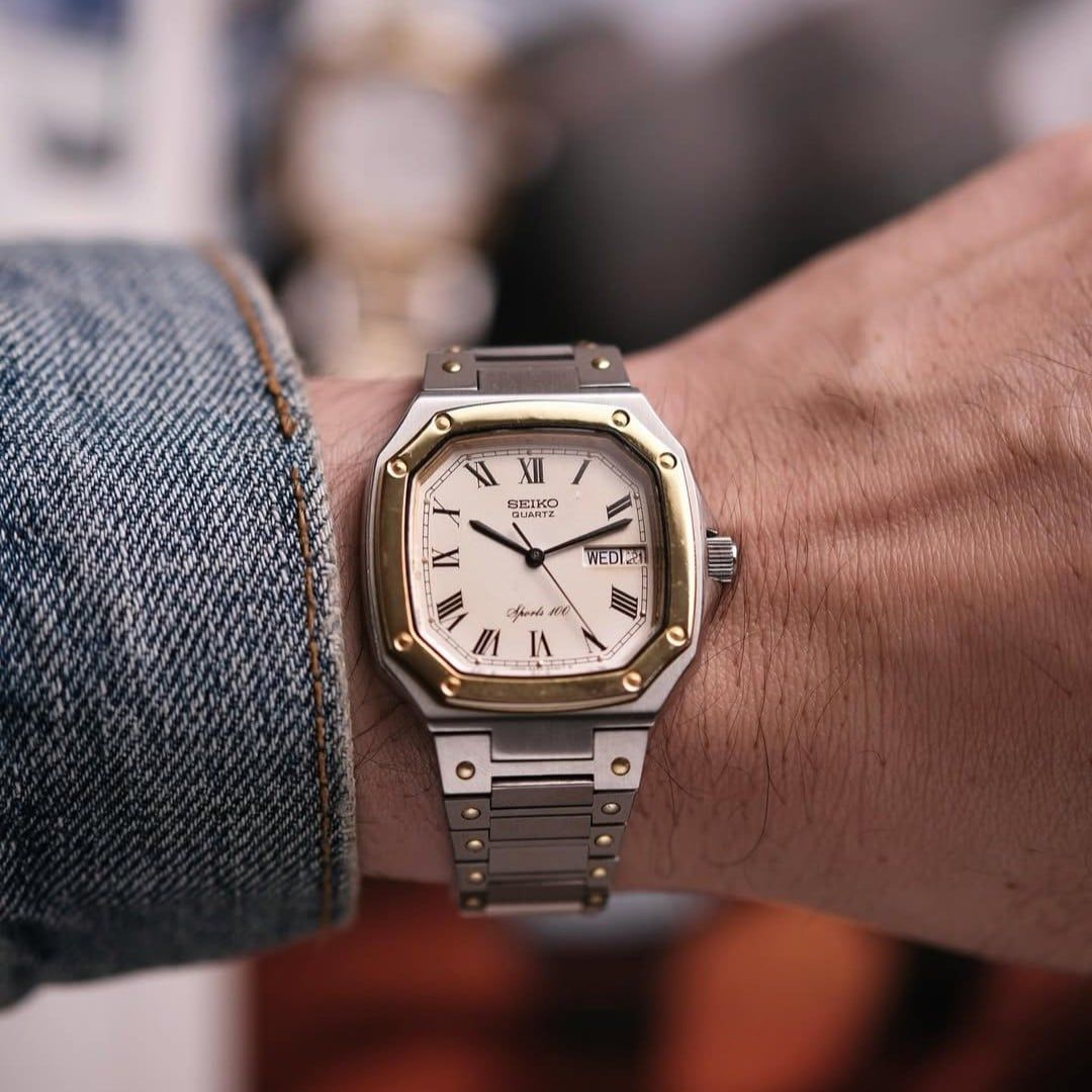  VINTAGE 1980'S SEIKO SQ SPORTS 100 TWO-TONE INTEGRATED BRACELET – REF. 6423-5030 