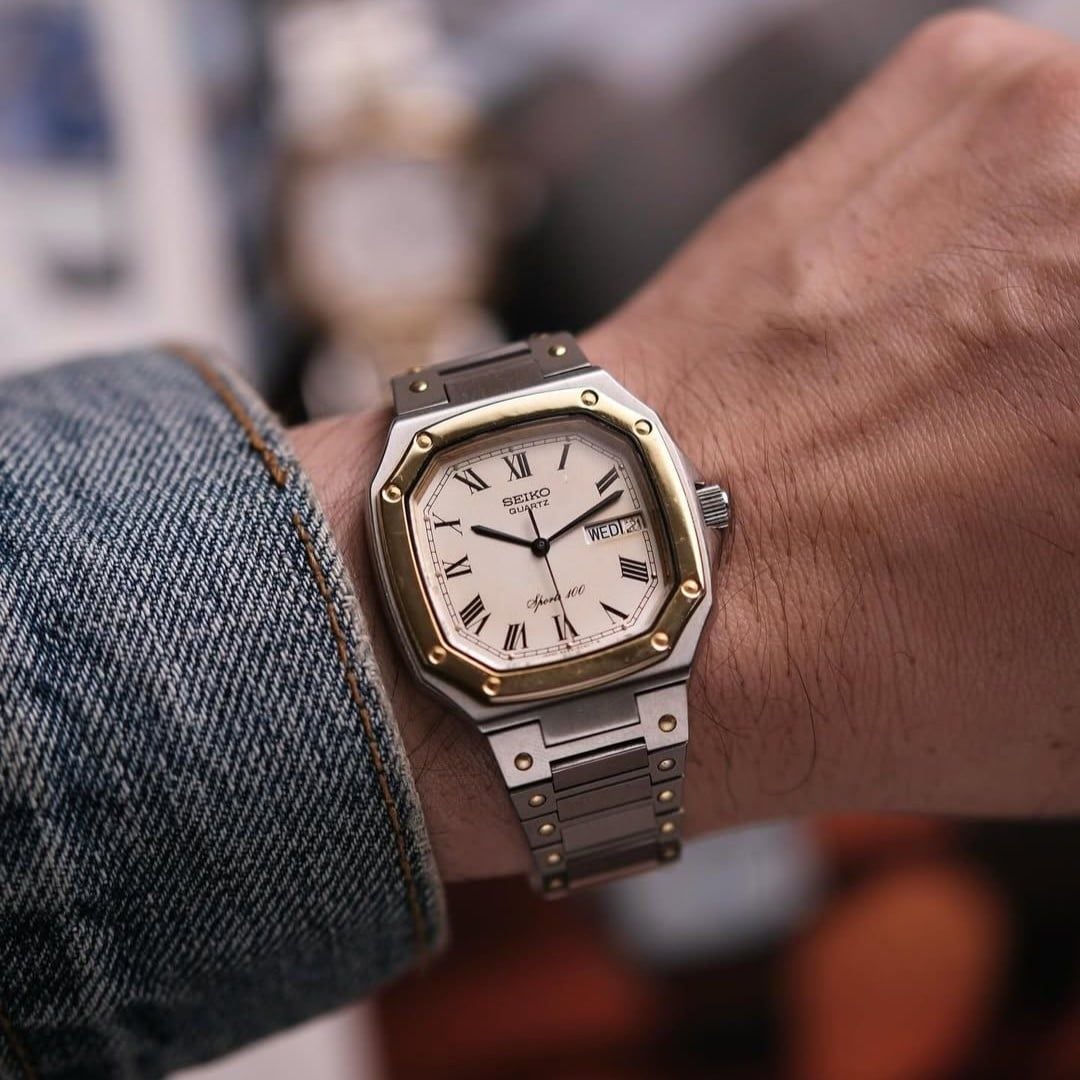  VINTAGE 1980'S SEIKO SQ SPORTS 100 TWO-TONE INTEGRATED BRACELET – REF. 6423-5030 