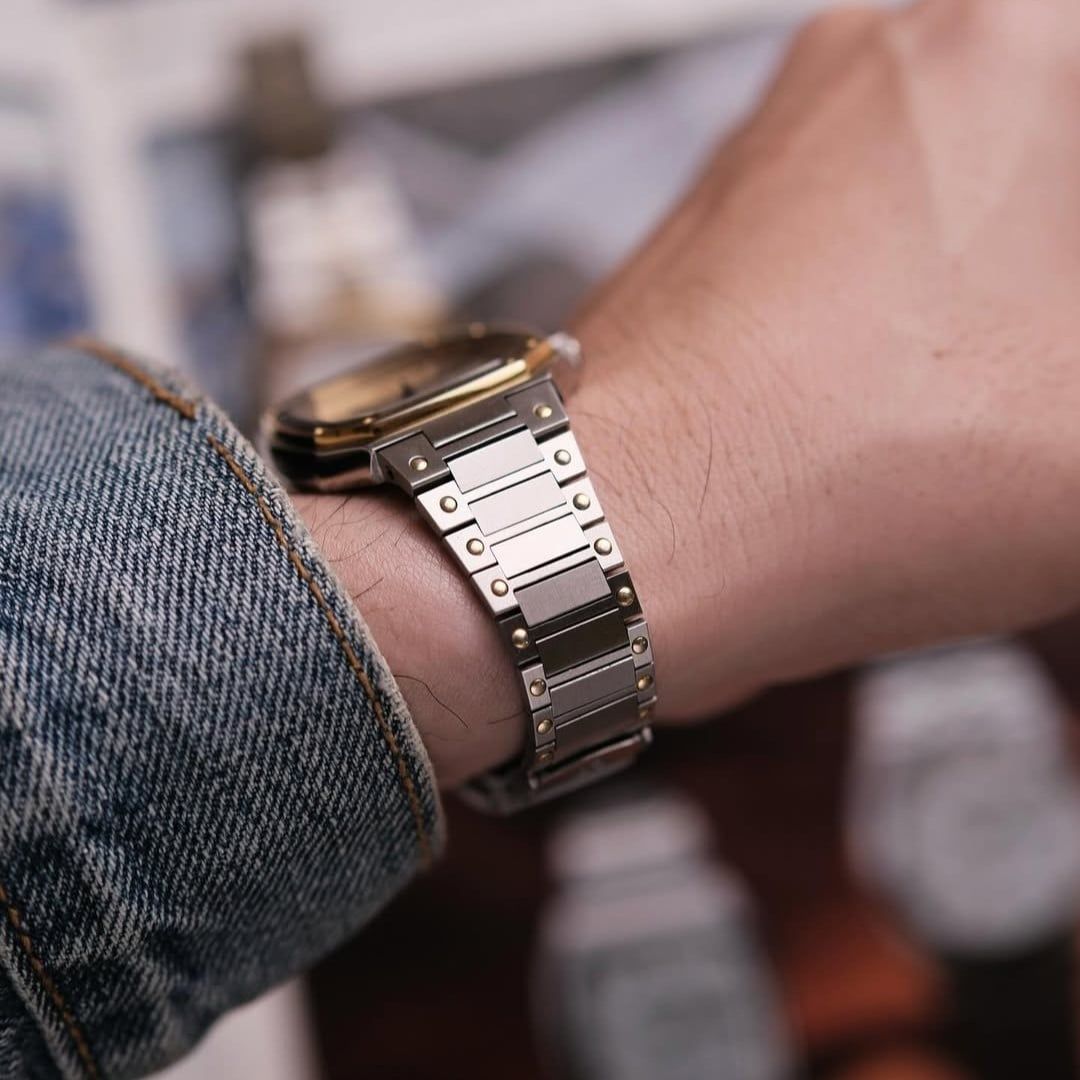  VINTAGE 1980'S SEIKO SQ SPORTS 100 TWO-TONE INTEGRATED BRACELET – REF. 6423-5030 