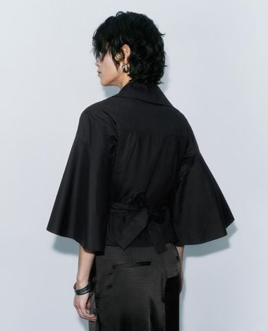  URBAN REVIVO - Áo kiểu nữ cổ V tay ống loe vạt chéo 