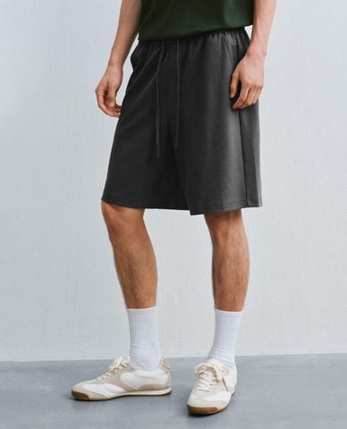  URBAN REVIVO - Quần short nam ống rộng lưng thun dây rút 
