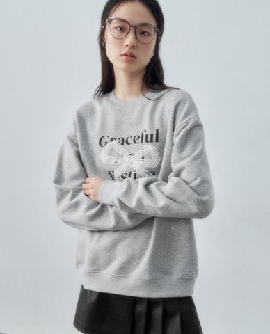  URBAN REVIVO - Áo sweatshirt nữ tay dài in họa tiết nơ 