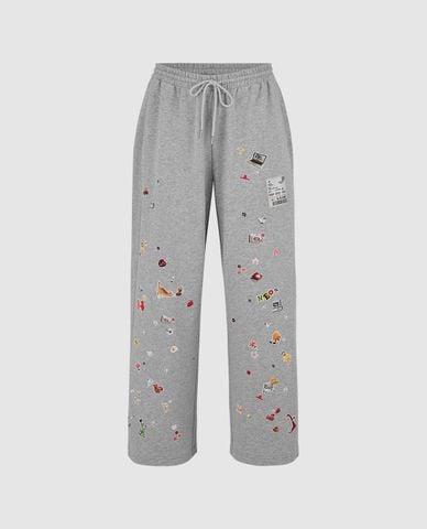  URBAN REVIVO - Quần nữ ống rộng lưng thun phối họa tiết 