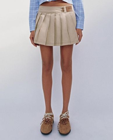  URBAN REVIVO - Chân váy xếp li mini phối nút cài 