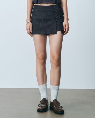  URBAN REVIVO - Chân váy denim mini phối nơ cá tính 
