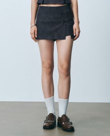  URBAN REVIVO - Chân váy denim mini phối nơ cá tính 