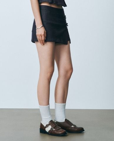  URBAN REVIVO - Chân váy denim mini phối nơ cá tính 
