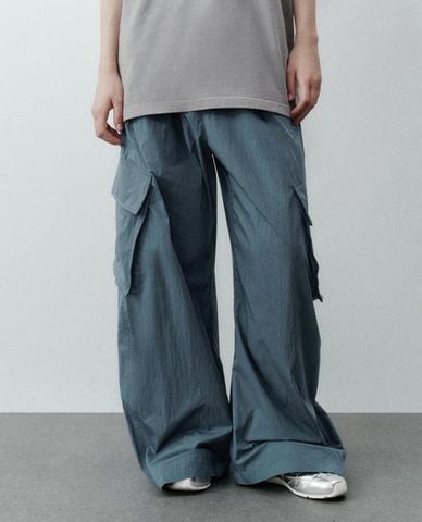  URBAN REVIVO - Quần nữ ống rộng lưng thun phối túi hộp 