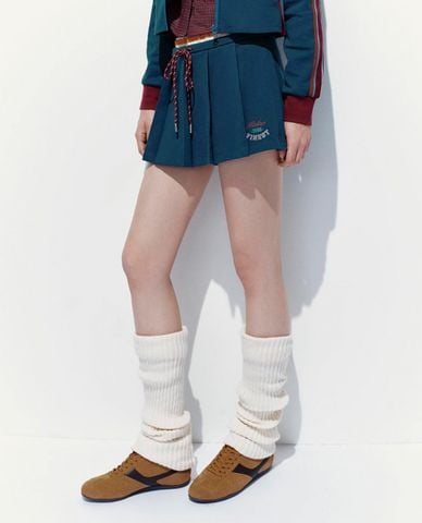  URBAN REVIVO - Chân váy xếp li mini phối viền 