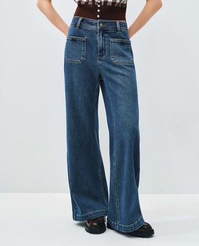 URBAN REVIVO - Quần jeans nữ ống loe wash bạc đính nơ 