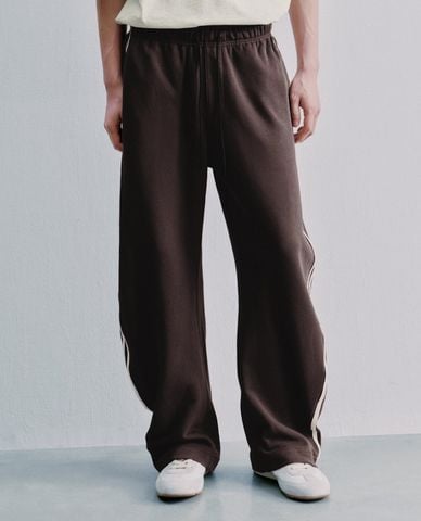  URBAN REVIVO - Quần dài nam ống rộng lưng thun phối sọc 