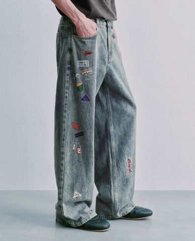  URBAN REVIVO - Quần jeans nam ống rộng in họa tiết 