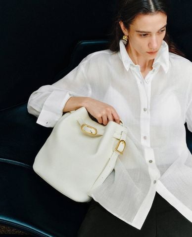  URBAN REVIVO - Túi rút dây nữ phối đai khoá kim loại 