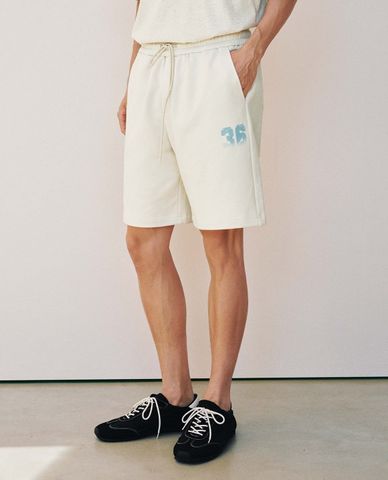 URBAN REVIVO - Quần short nam ống rộng in họa tiết 