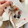 Móc khóa dây máy ảnh nĩa