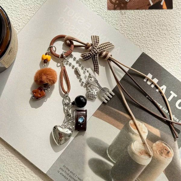 Móc khóa dây máy ảnh nĩa