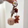 Móc khóa gấu cục lông nâu