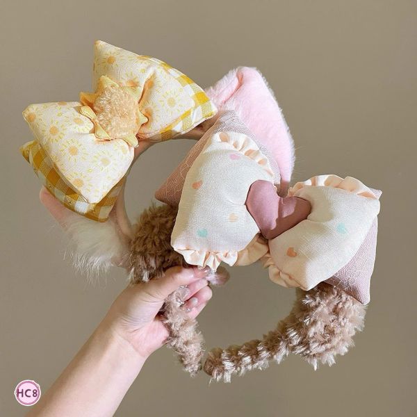 Cài tóc lông cừu nơ Tai Cáo