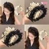 Xược phồng chấm bi nơ đen trắng