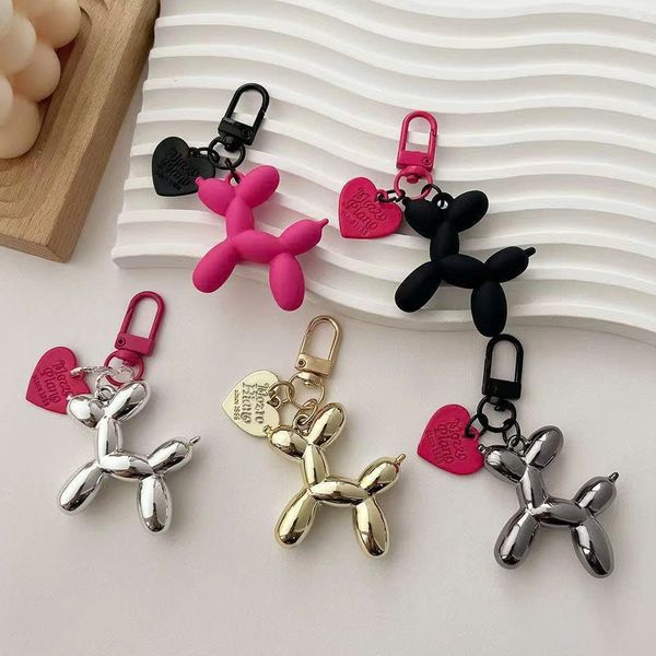 Móc khóa cún bạc tim